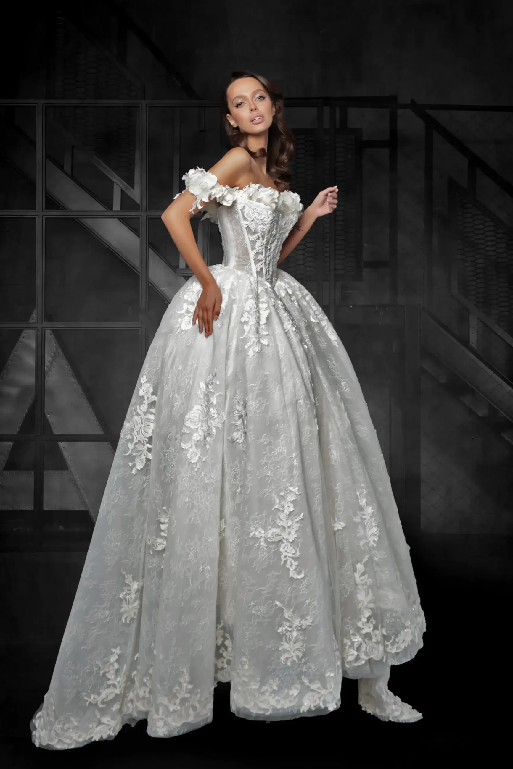 model is wearing a basque waist ball gown