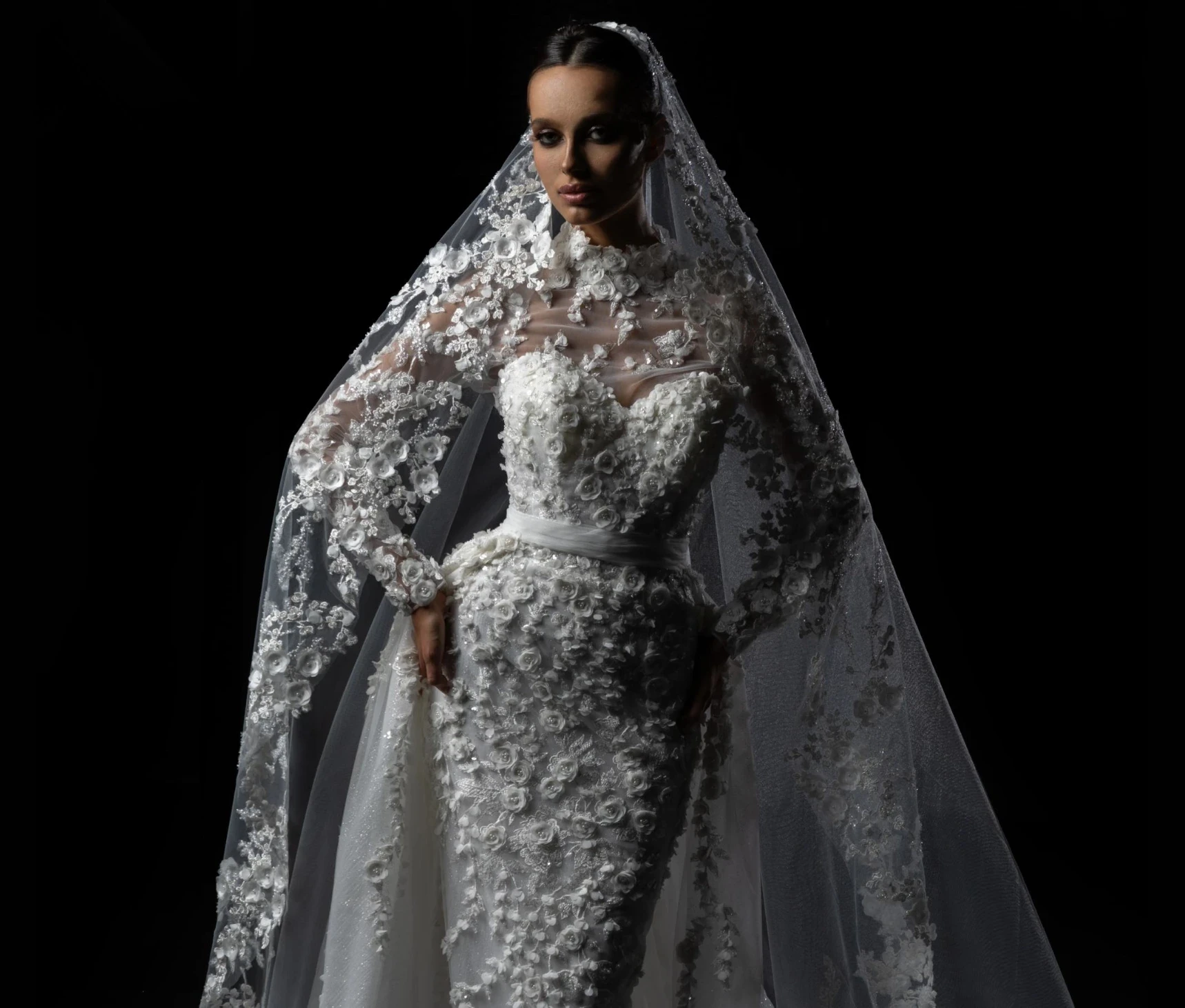 Model wearing a white bridal gown