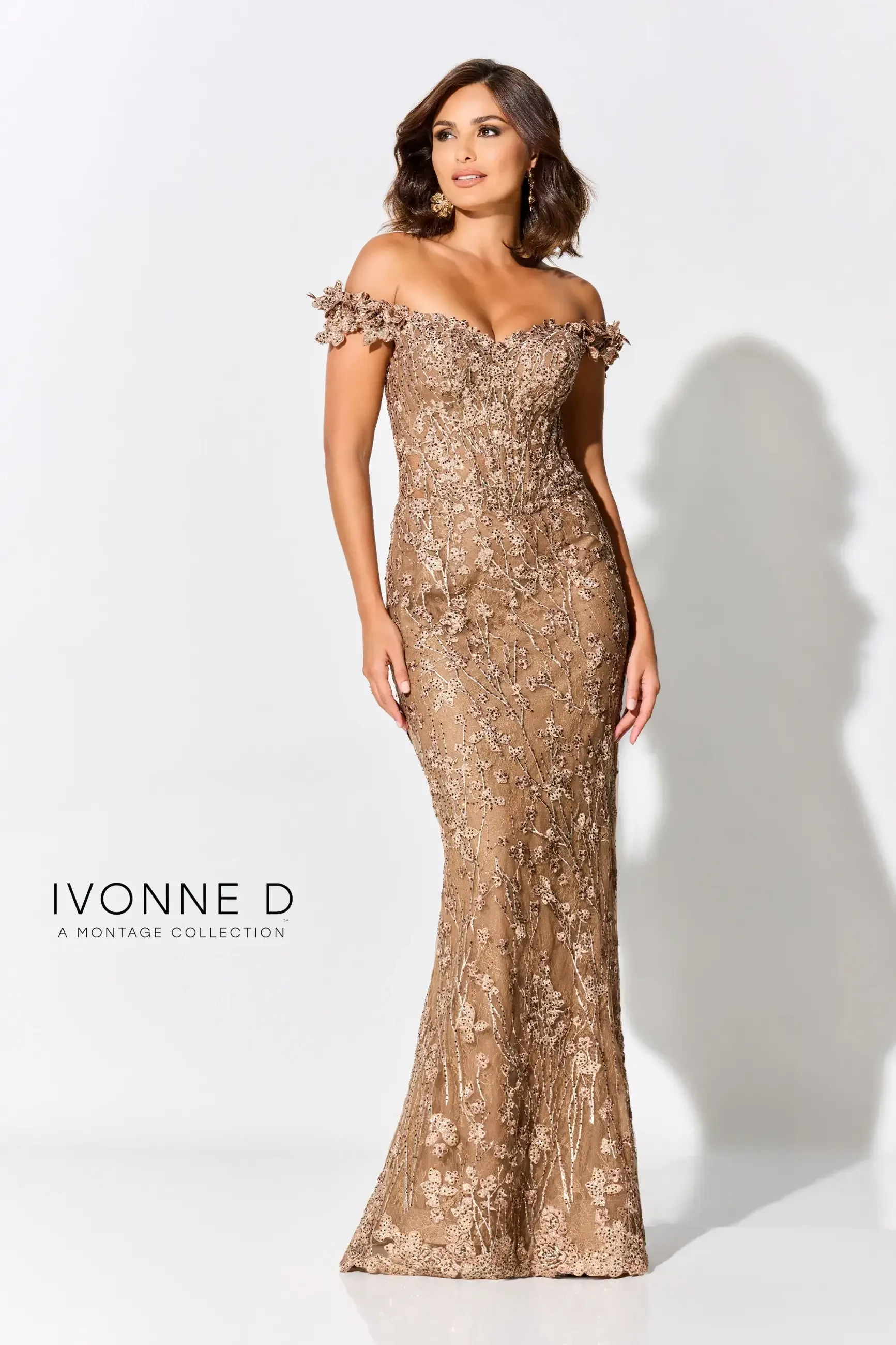 model is wearing an off the shoulder gold mother sdress