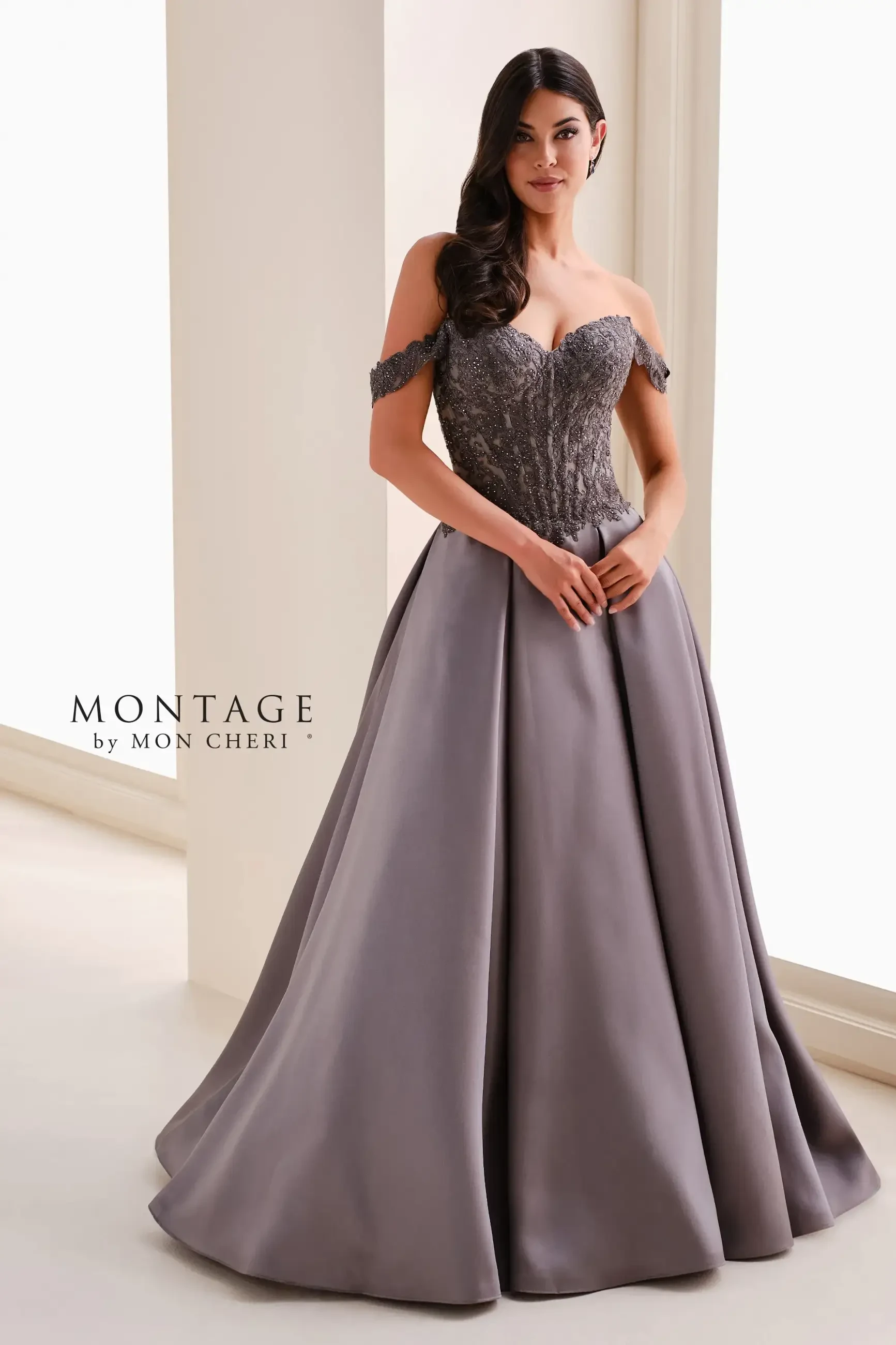 model is wearing an off the shoulder a-line mothers dress